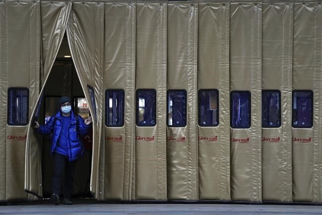 Wary, weary world slams doors shut, fearing omicron variant